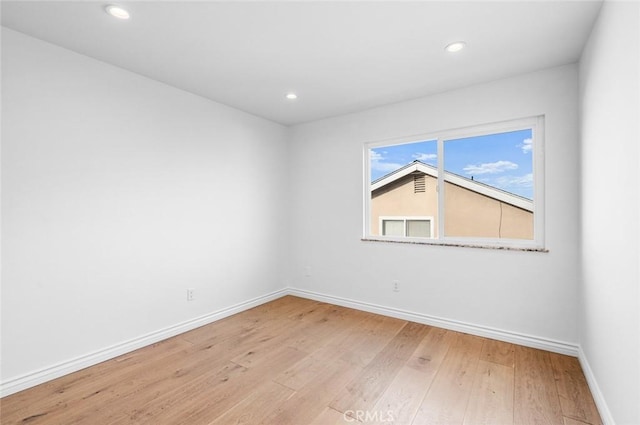 empty room featuring light hardwood / wood-style floors