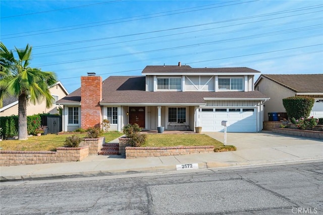 view of front of property with a garage