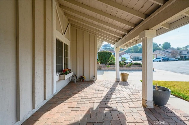 view of patio featuring a porch