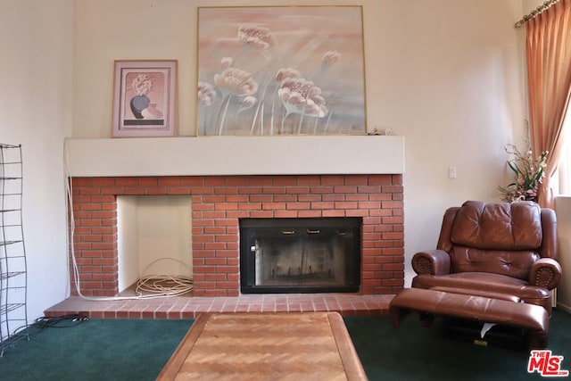 living room featuring a fireplace