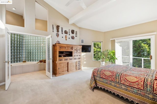 bedroom with ceiling fan, lofted ceiling with beams, and carpet flooring