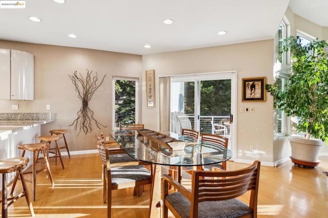 dining room with light hardwood / wood-style floors