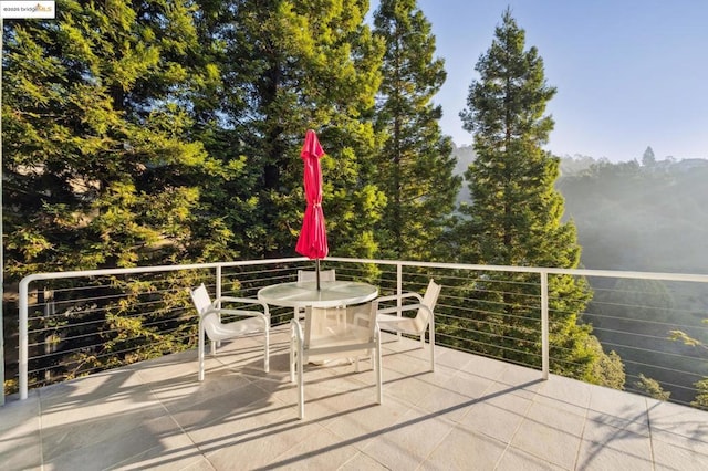 view of patio / terrace featuring a balcony