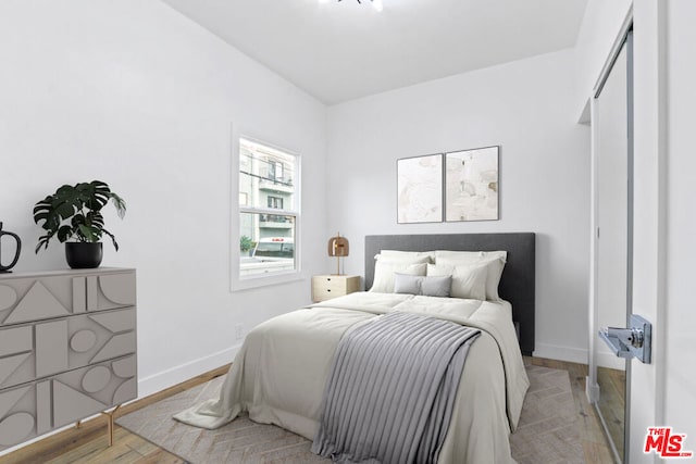 bedroom featuring light wood-type flooring