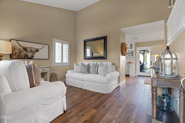 living room with dark wood-type flooring