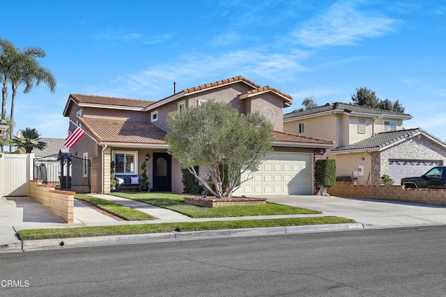 mediterranean / spanish-style home with a garage