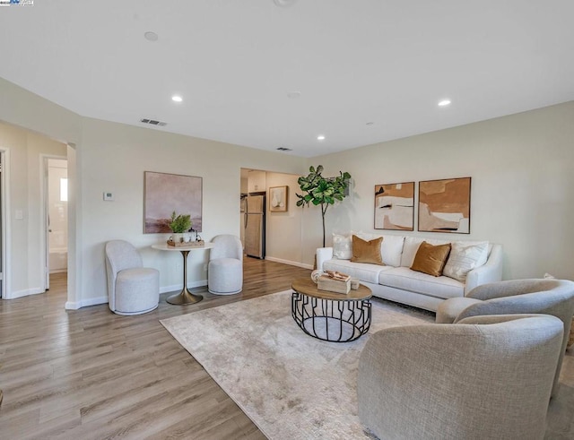 living room with light wood-type flooring