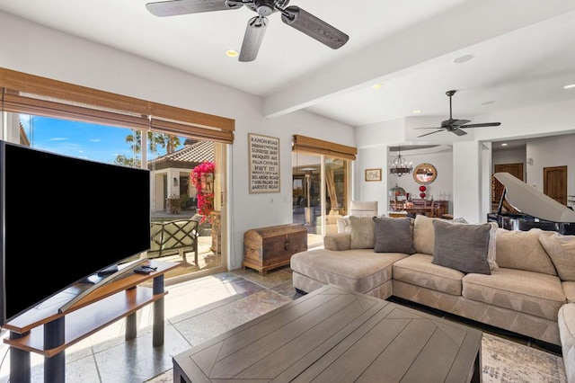 living room featuring a chandelier and beamed ceiling