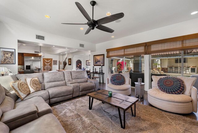 living room with ceiling fan