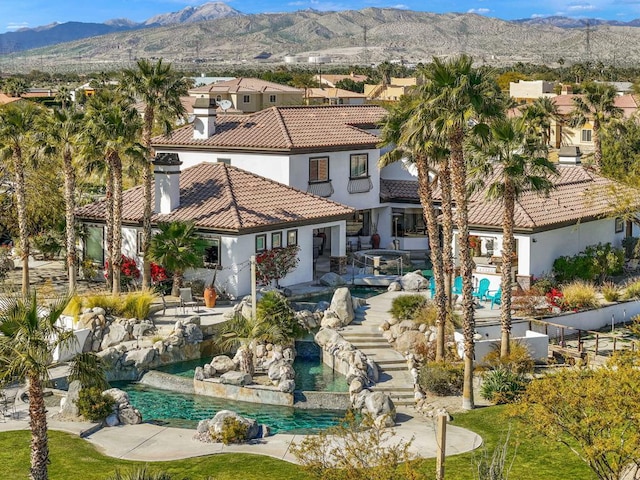 exterior space with a mountain view