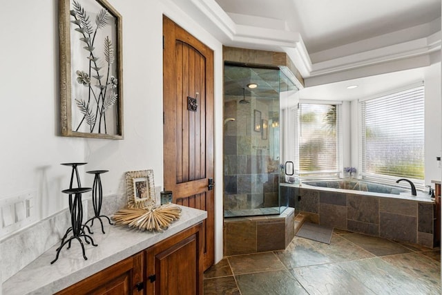 bathroom featuring independent shower and bath