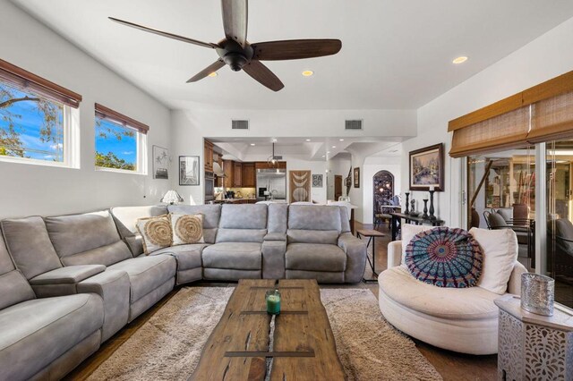 living room featuring ceiling fan