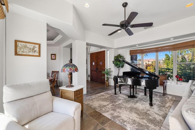 sitting room with ceiling fan