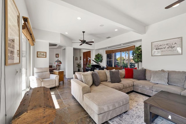 living room with ceiling fan and beam ceiling