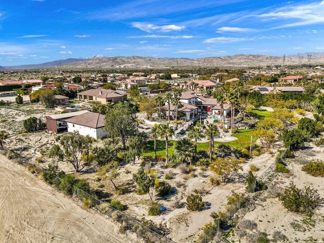 bird's eye view with a mountain view