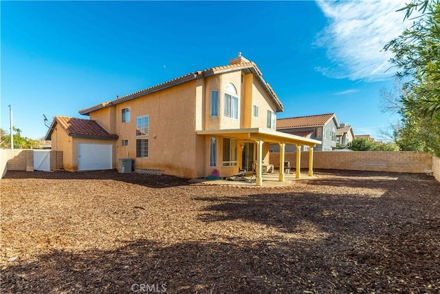 rear view of house with a patio