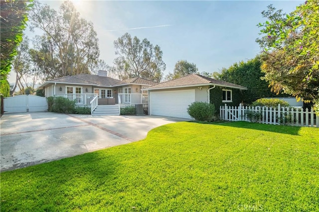 ranch-style home featuring a front yard and a garage