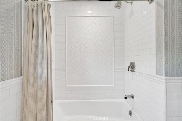 bathroom featuring shower / tub combo with curtain