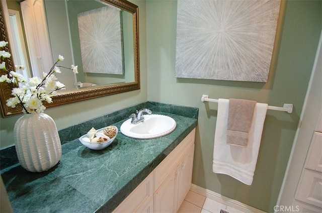 bathroom featuring vanity and tile patterned flooring