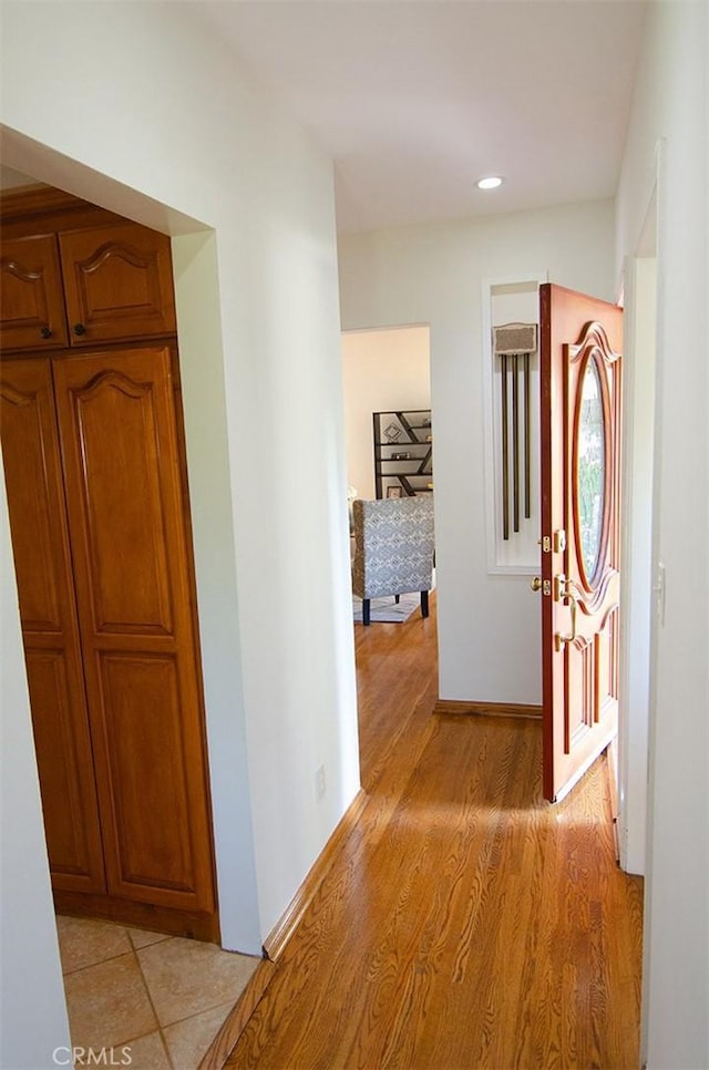 corridor featuring light wood-type flooring