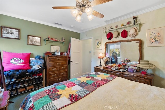 bedroom with ceiling fan and ornamental molding