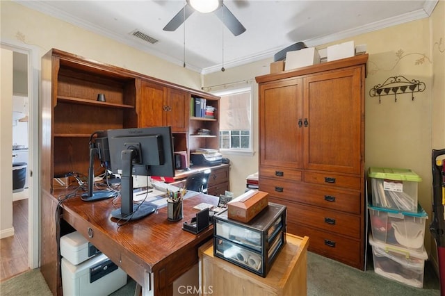 carpeted office with ceiling fan and crown molding