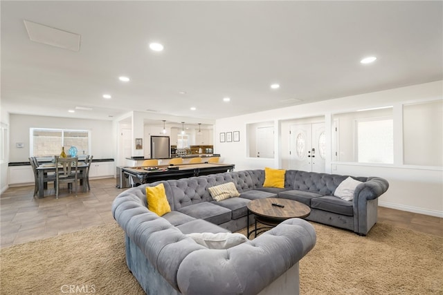 living room with light tile patterned floors