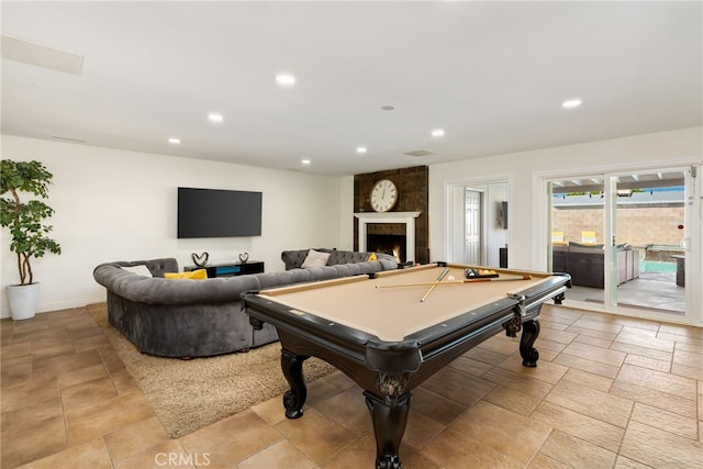 game room featuring a fireplace and billiards