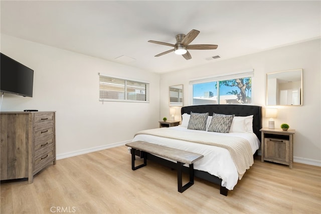 bedroom featuring ceiling fan and light hardwood / wood-style flooring