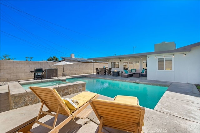 view of swimming pool with an outdoor living space, area for grilling, and a patio