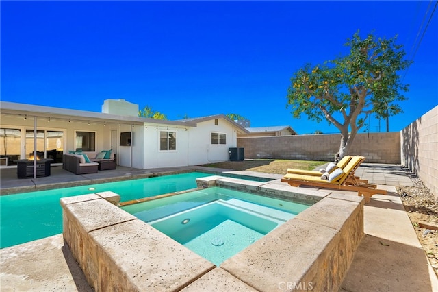 view of pool with cooling unit, outdoor lounge area, a patio, and an in ground hot tub