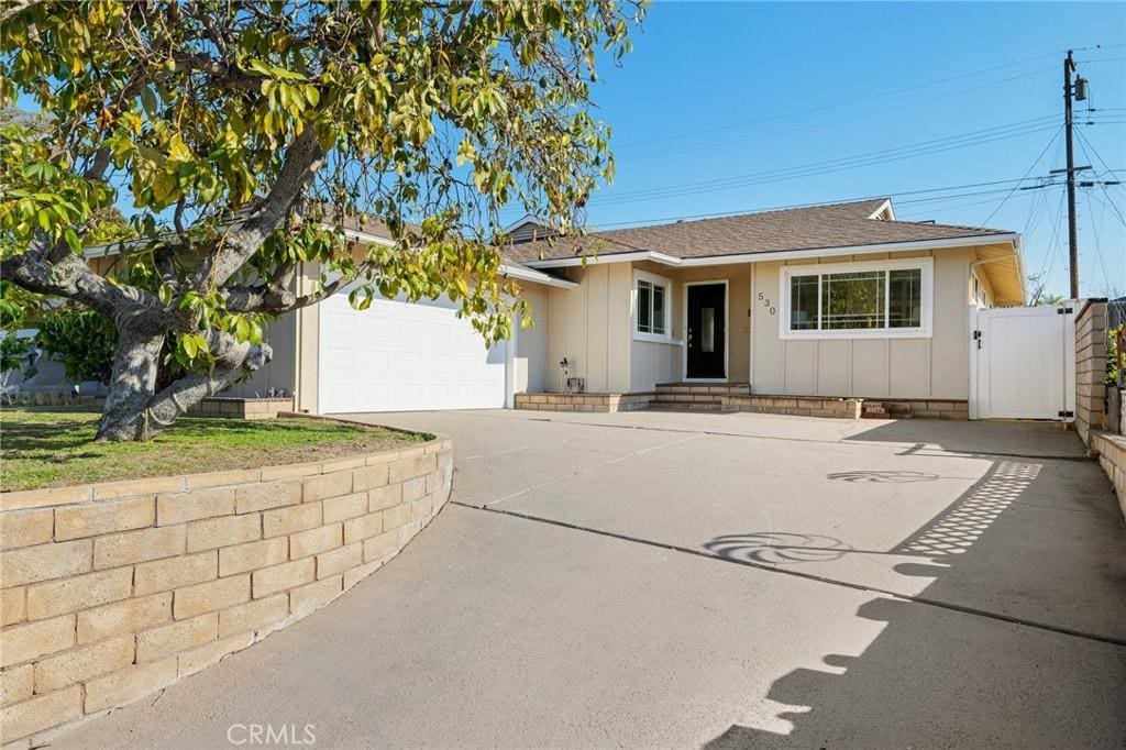 ranch-style home with a garage