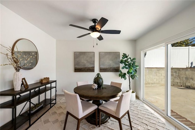 dining area with ceiling fan