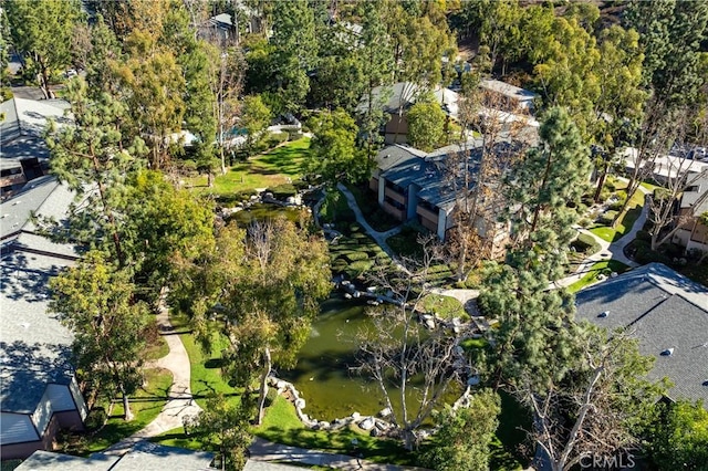 bird's eye view with a water view