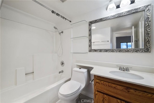 full bathroom with vanity, toilet, and  shower combination