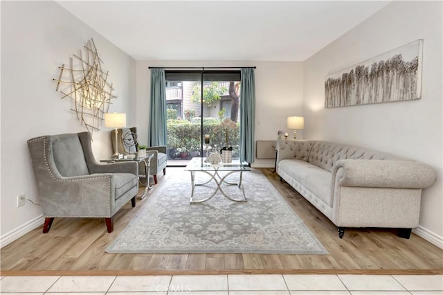 20702 El Toro Rd Unit 359, Lake Forest, CA 92630 - living room with baseboards and wood finished floors