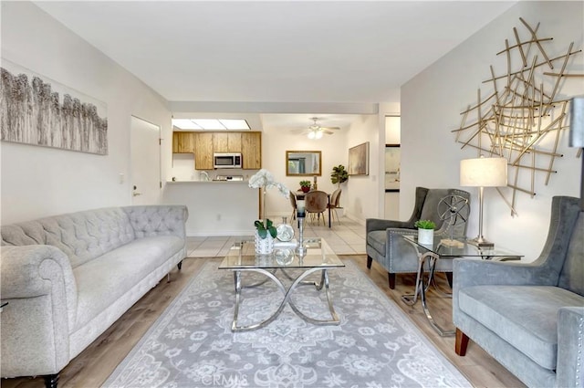 20702 El Toro Rd Unit 359, Lake Forest, CA 92630 - living area with a ceiling fan and light wood-type flooring