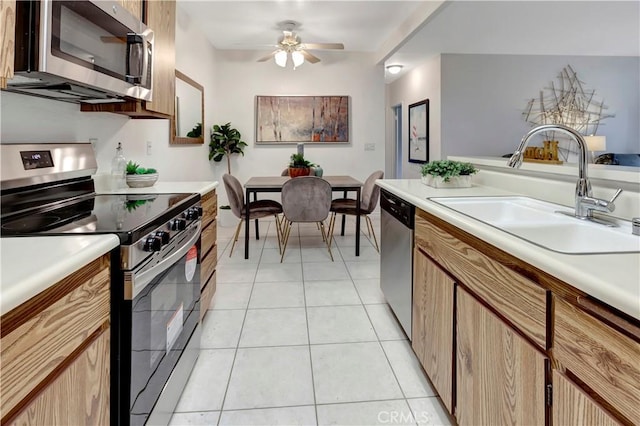20702 El Toro Rd Unit 359, Lake Forest, CA 92630 - kitchen with light countertops, appliances with stainless steel finishes, and a sink