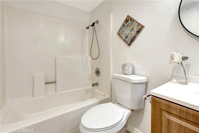 full bathroom with vanity, tub / shower combination, and toilet