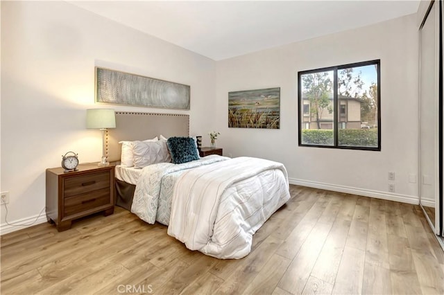 bedroom featuring light hardwood / wood-style flooring