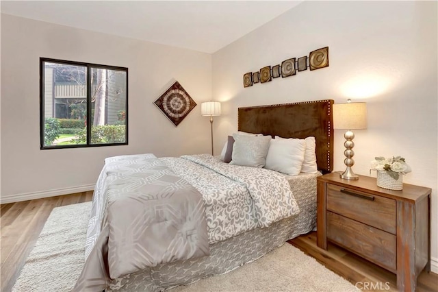 bedroom featuring light wood-type flooring