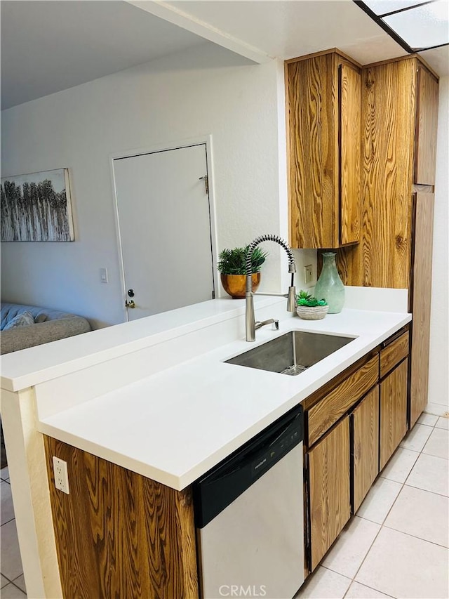 20702 El Toro Rd Unit 359, Lake Forest, CA 92630 - kitchen with dishwasher, a sink, light tile patterned floors, light countertops, and open floor plan