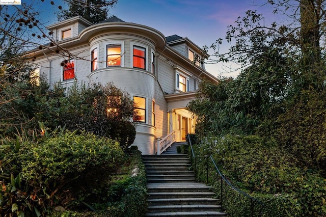 view of property exterior at dusk