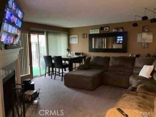 living room featuring carpet flooring