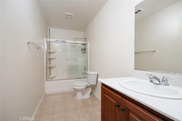 full bathroom with toilet, vanity, and shower / bath combination with glass door