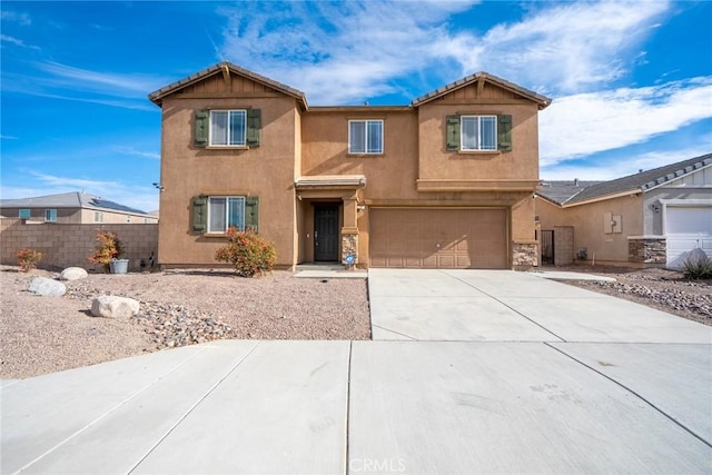 view of front of property with a garage