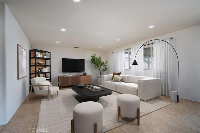 living room with light tile patterned floors