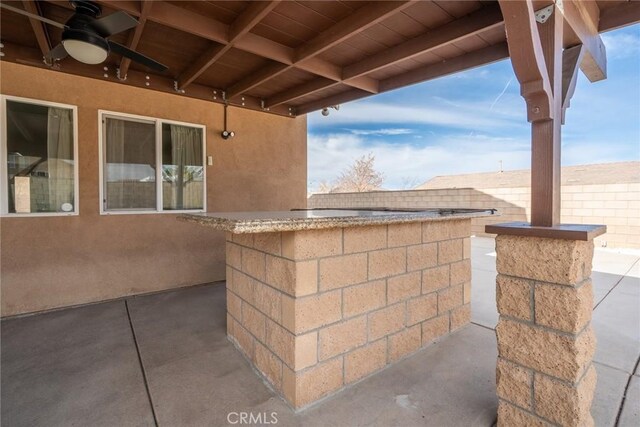 view of patio / terrace with ceiling fan