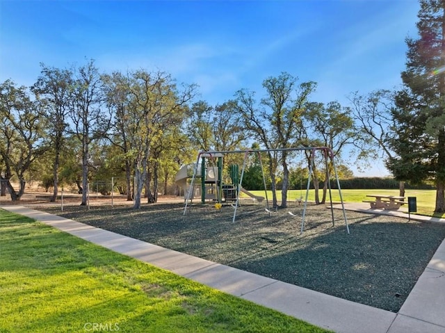 view of playground featuring a yard