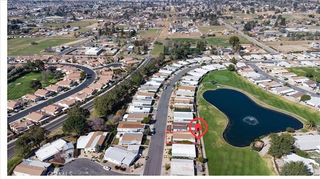 bird's eye view featuring a residential view, a water view, and golf course view